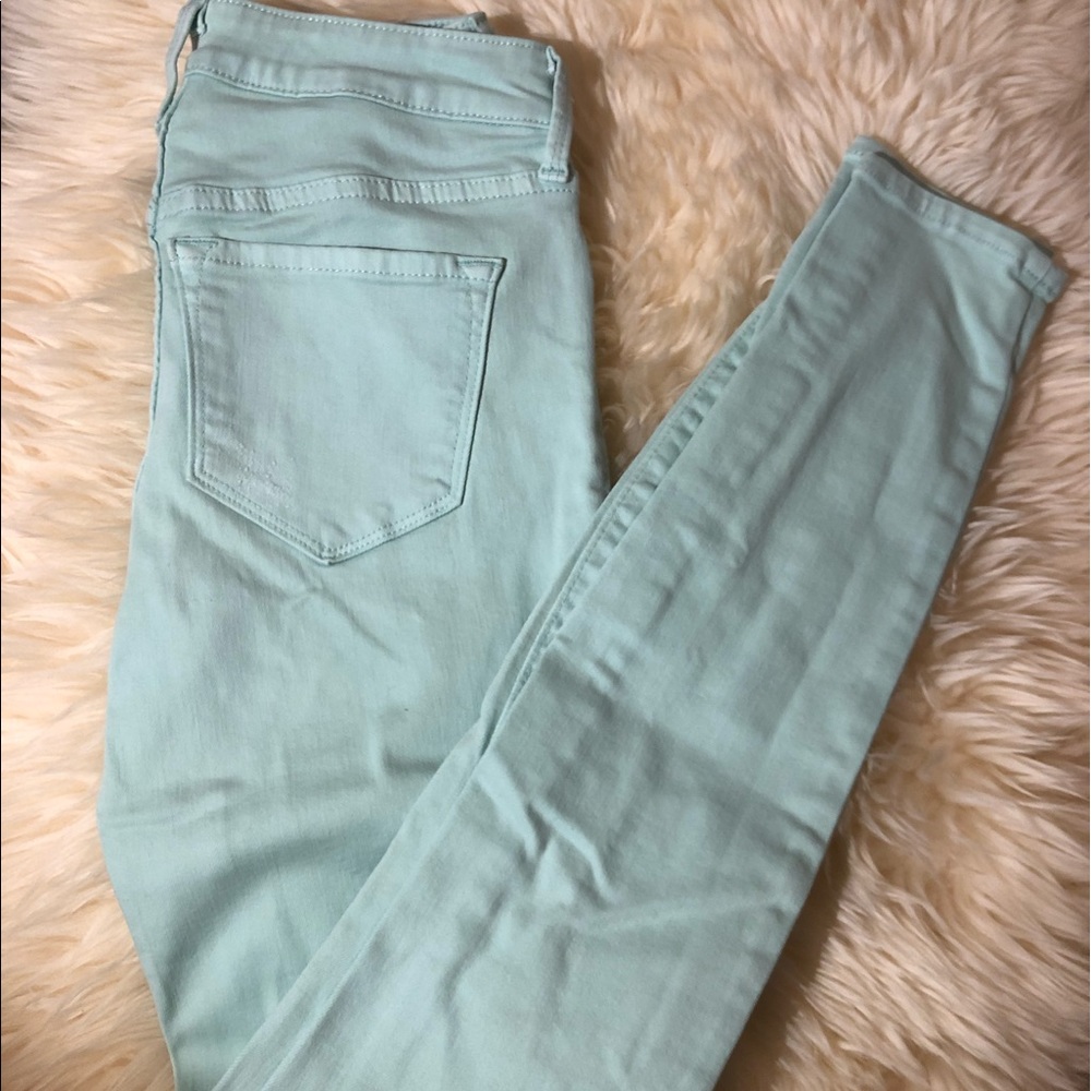 Old navy slightly distressed light turquoise jeans